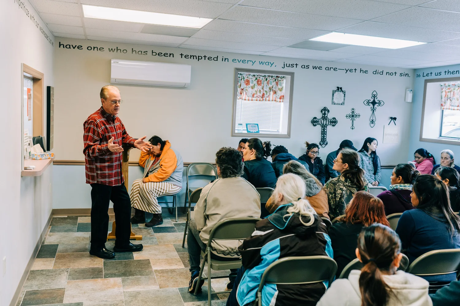 A counselor speaks with neighbors at the Care Center